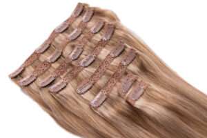 This image shows a closeup of the points of attachment of a set of clip-in extensions from Aranki Hair